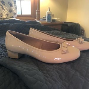 Cream colored Block heeled flats.